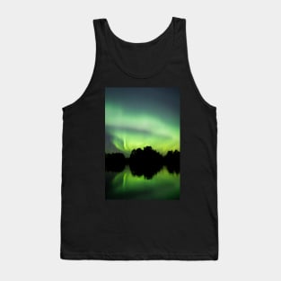 Northern lights glowing over lake in Finland Tank Top